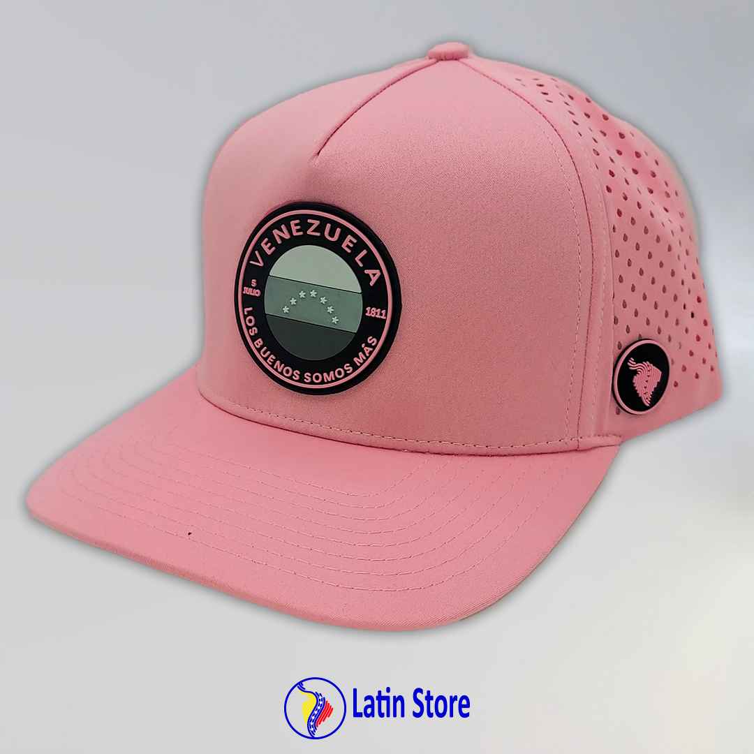 Gorra Latin Store "Los Buenos Somos Más" microperforada snapback Rosado